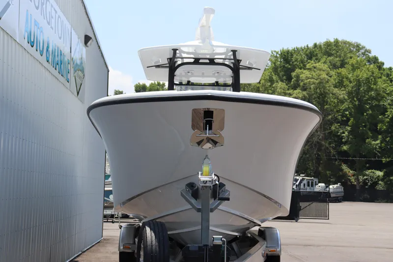 Slide: The Image of 2025 Yellowfin 32 Offshore boat on trailer, front view. - 21