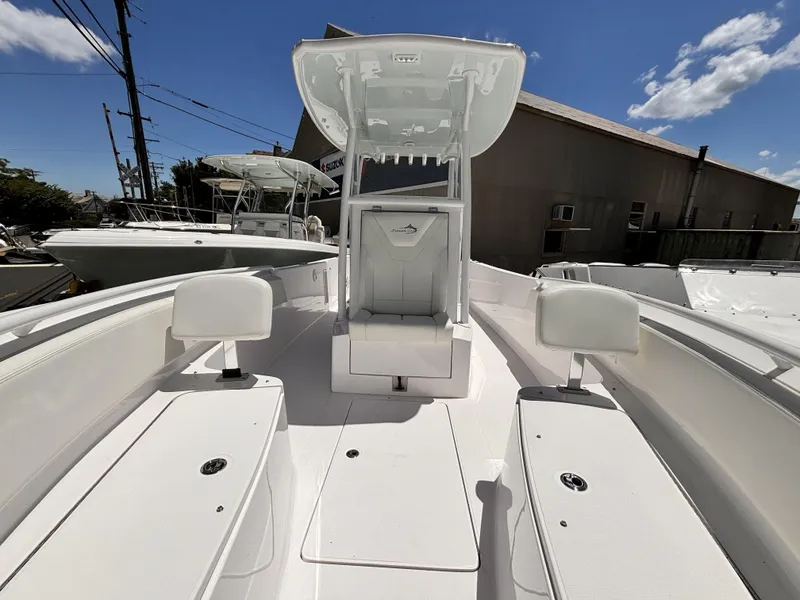 Slide: The Image of 2022 Streamline 26CC boat with white interior and center console. - 10