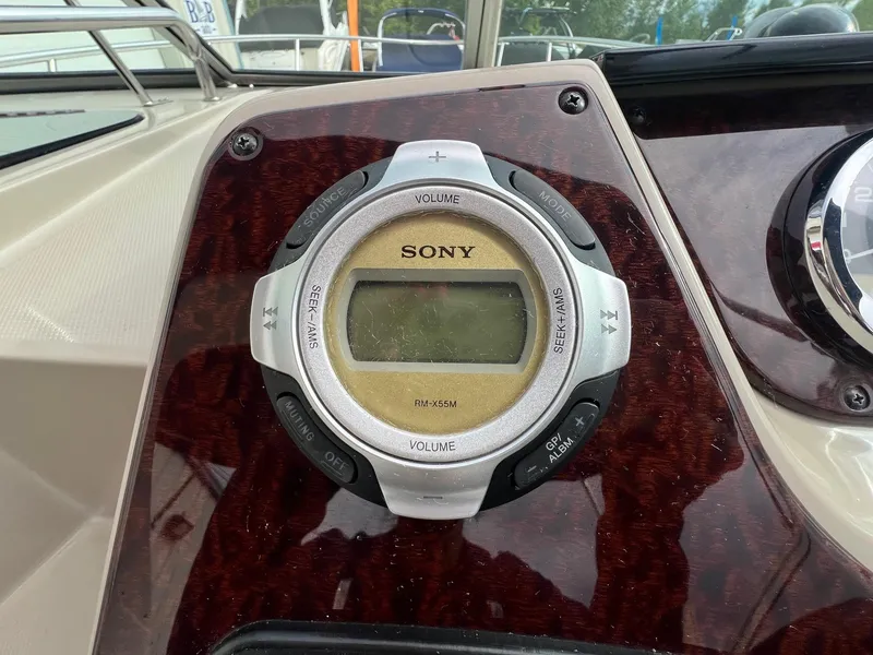 Slide: The Image of Sony audio control panel on 2009 Sea Ray 270 Sundancer boat dashboard. - 19