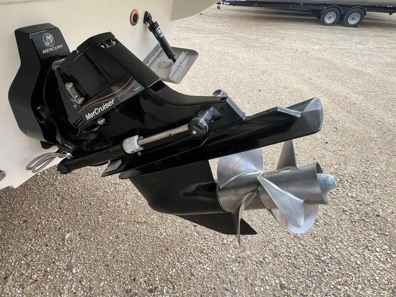 Slide: The Image of MerCruiser engine on 2009 Sea Ray 270 Sundancer, featuring a dual propeller system. - 4