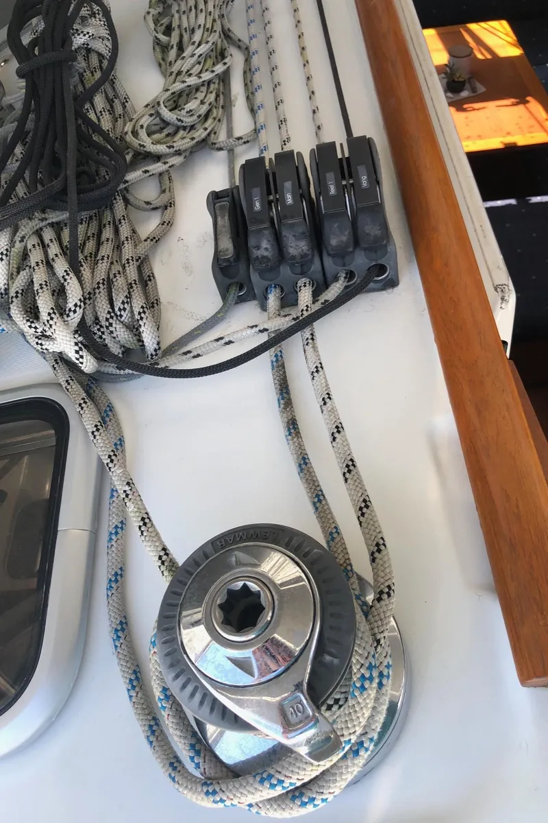 Slide: The Image of Beneteau 40 sailboat deck with winch and rope clutches, 2008 model. - 19