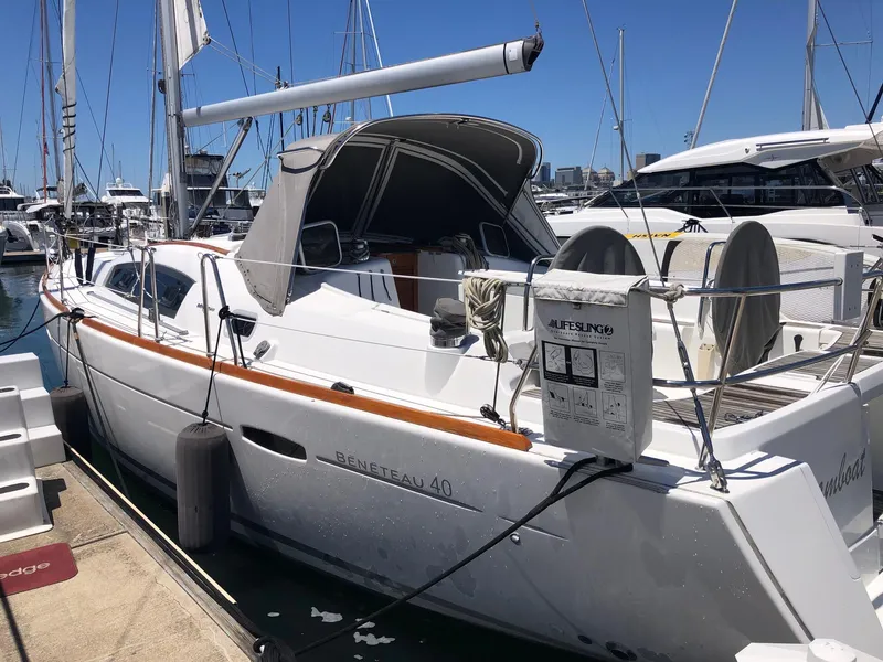Slide: The Image of 2008 Beneteau 40 sailboat docked at a marina on a sunny day. - 25
