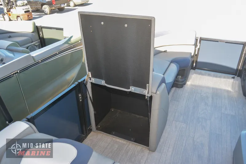Slide: The Image of 2023 Tahoe Pontoon LTZ Elite interior storage compartment. - 26