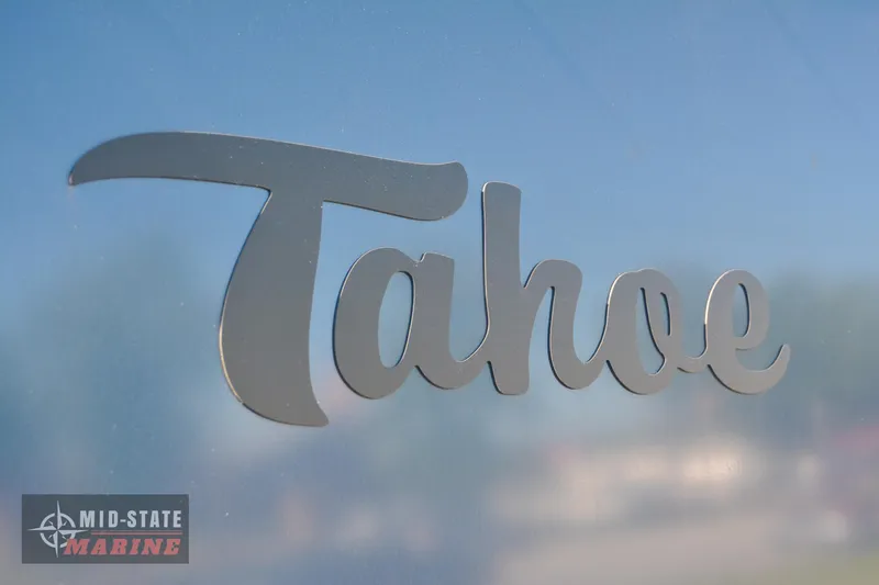 Slide: The Image of 2023 Tahoe Pontoon LTZ Elite logo on boat exterior, Mid-State Marine dealership. - 6