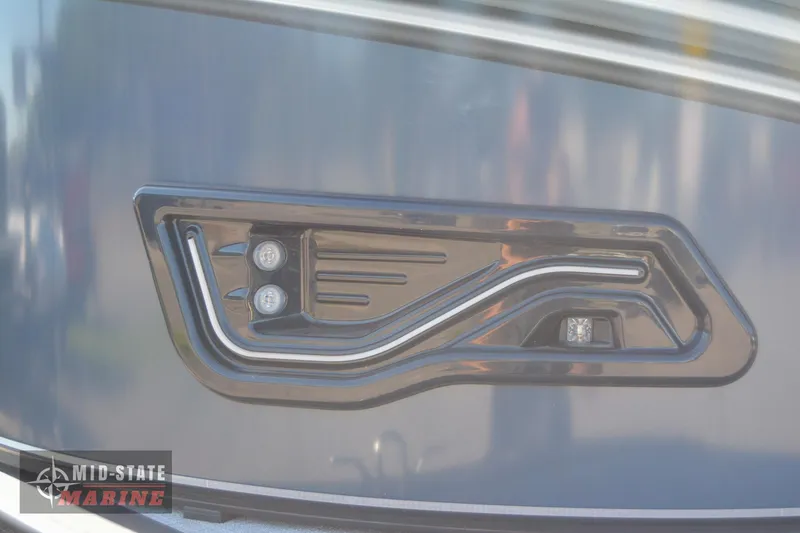 Slide: The Image of Close-up of 2023 Tahoe Pontoon LTZ Elite boat's sleek tail light design. - 8