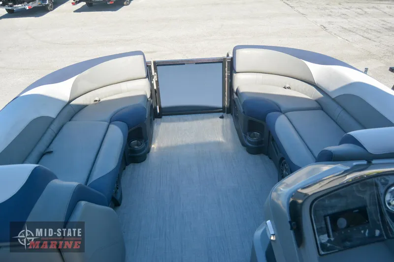 Slide: The Image of 2023 Tahoe Pontoon LTZ Elite interior with spacious seating and modern design. - 9
