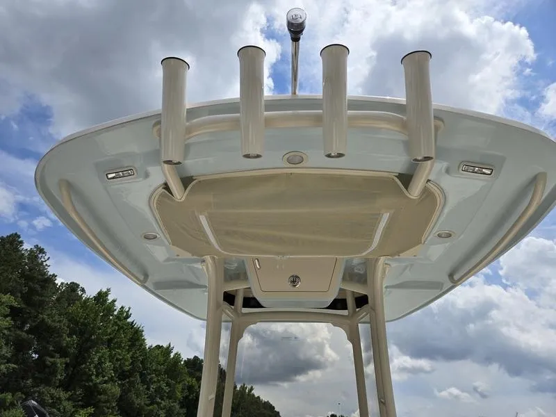 Slide: The Image of 2025 Grady-White 231 CE boat top view with rod holders and canopy. - 21