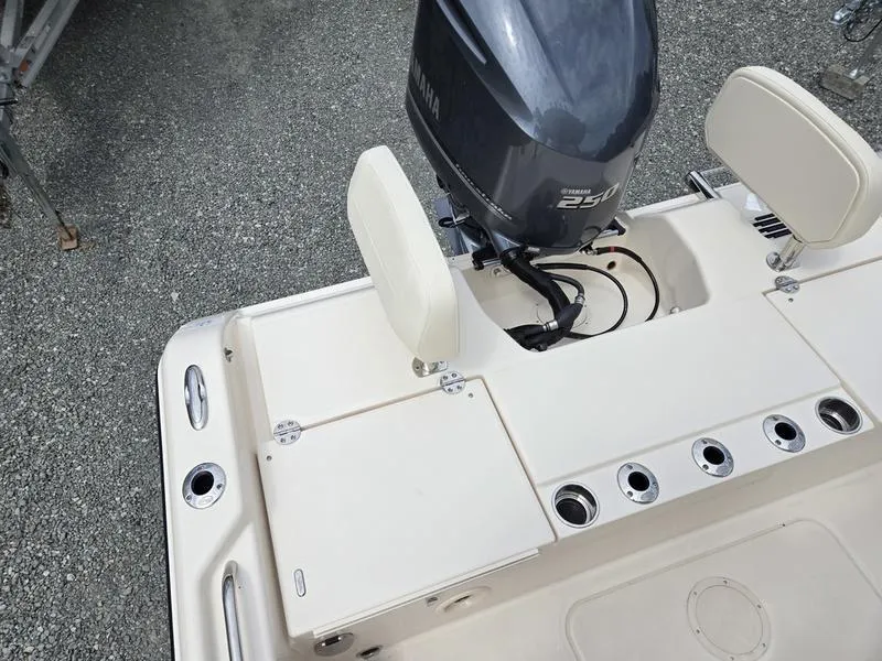 Slide: The Image of 2025 Grady-White 231 CE boat with Yamaha 250 engine, rear seating and rod holders. - 5