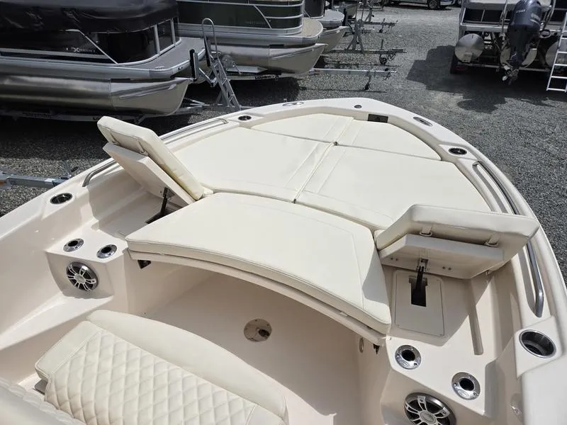 Slide: The Image of 2025 Grady-White 231 CE boat with spacious seating and cup holders. - 7