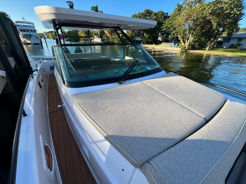 Slide: The Image of 2023 Axopar 37 Sun-Top boat with spacious deck and modern design. - 40