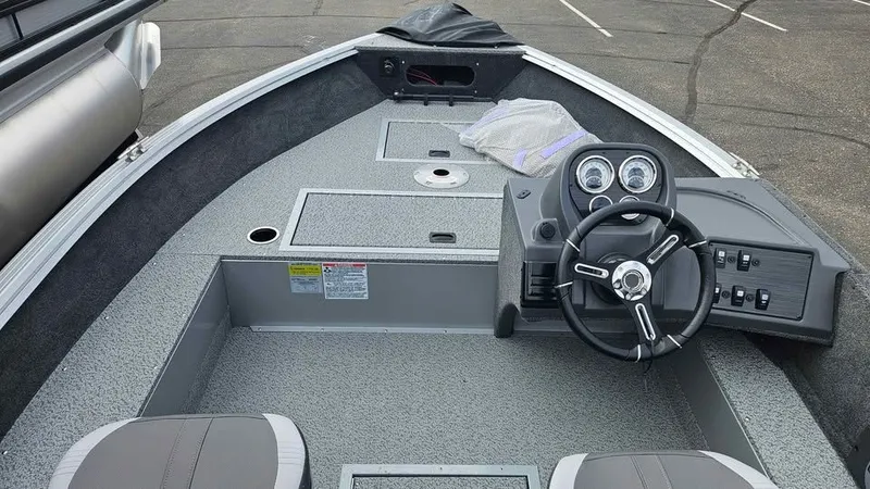 Slide: The Image of Interior of Starcraft Stealth 166 SC boat, model year 2025. - 11
