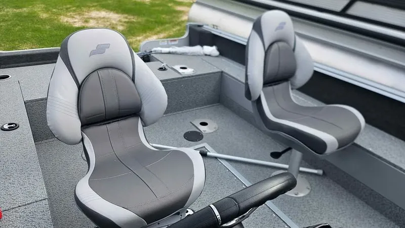 Slide: The Image of Interior of Starcraft Stealth 166 SC boat, gray seats, year 2025. - 3