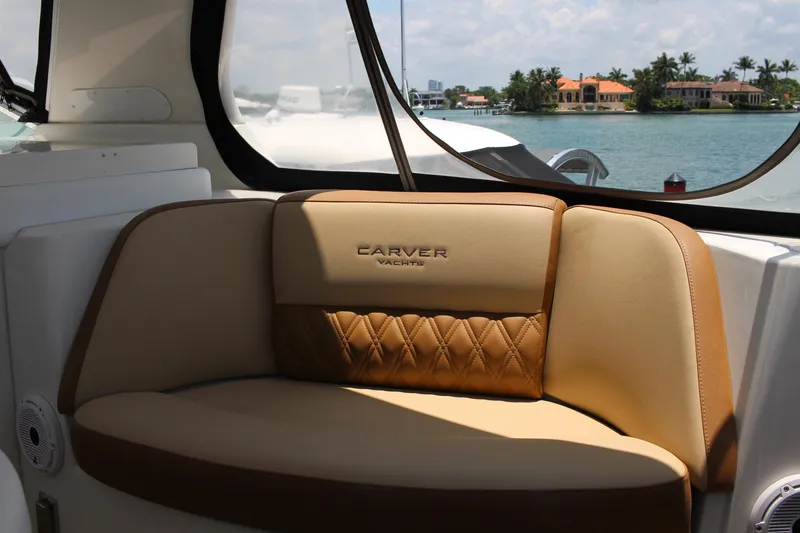 Slide: The Image of 2006 Carver 560 Voyager yacht interior with tan leather seating. - 24