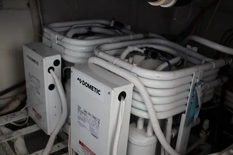 Slide: The Image of Dometic air conditioning units in 2006 Carver 560 Voyager yacht engine room. - 33