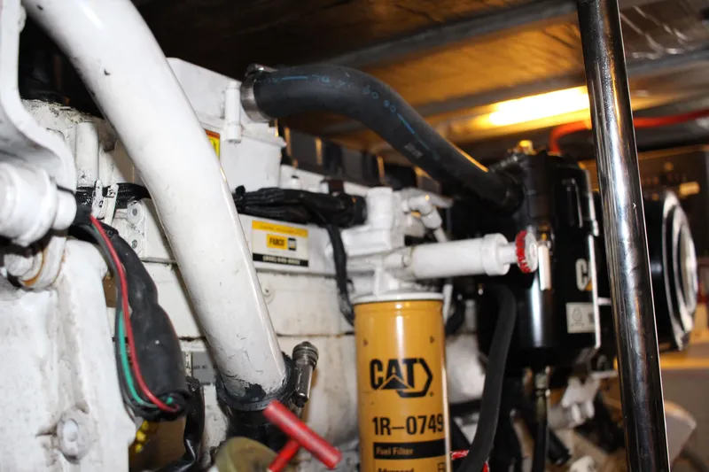 Slide: The Image of Engine compartment of a 2006 Carver 560 Voyager yacht with CAT fuel filter. - 35