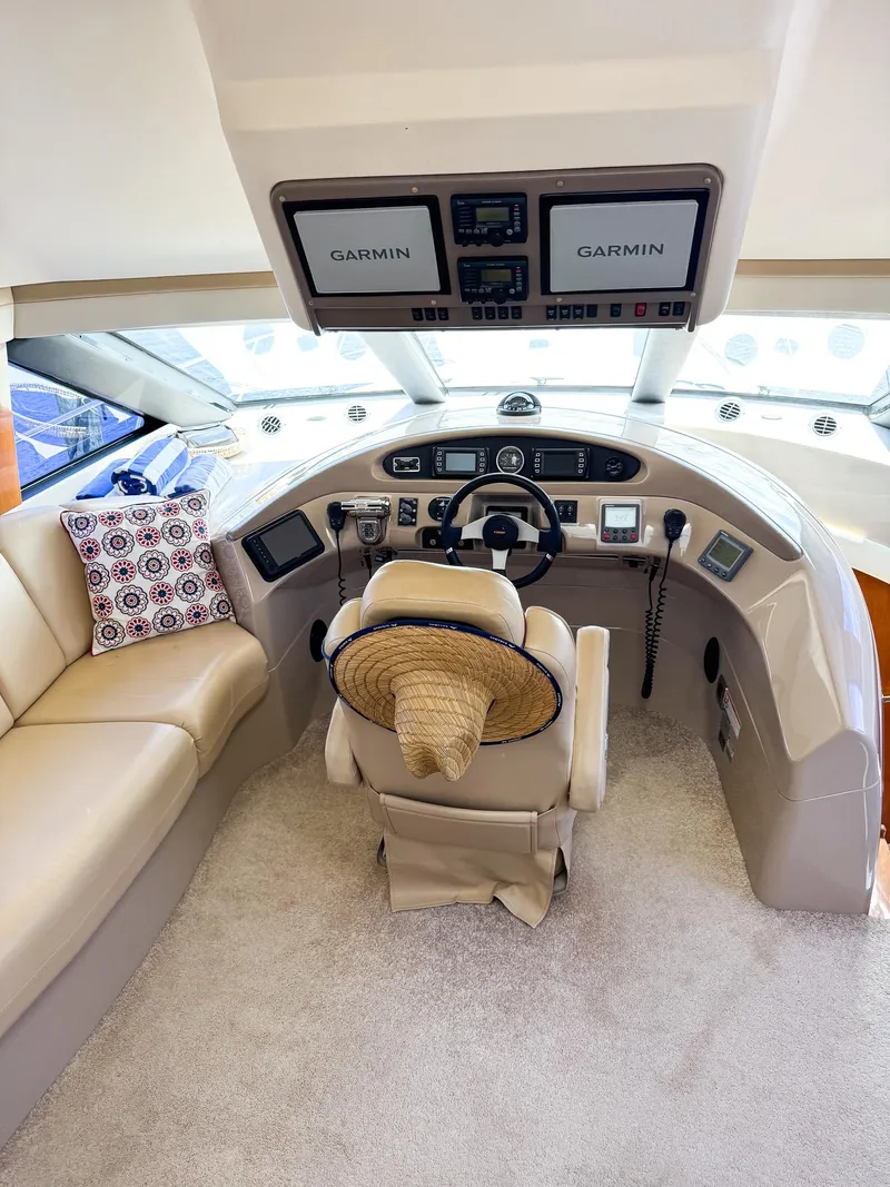 Slide: The Image of Helm of 2006 Carver 560 Voyager with Garmin navigation systems. - 10