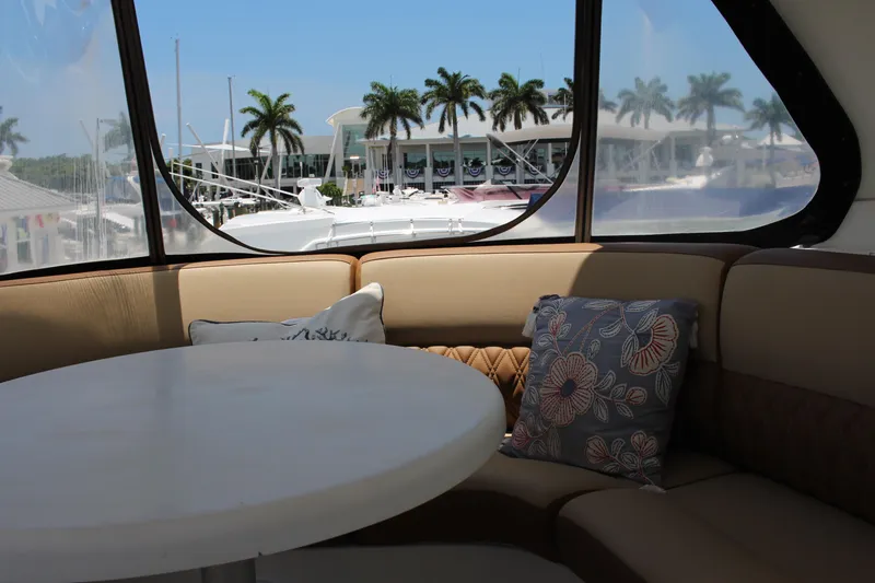 Slide: The Image of Interior of 2006 Carver 560 Voyager yacht with seating and table. - 20