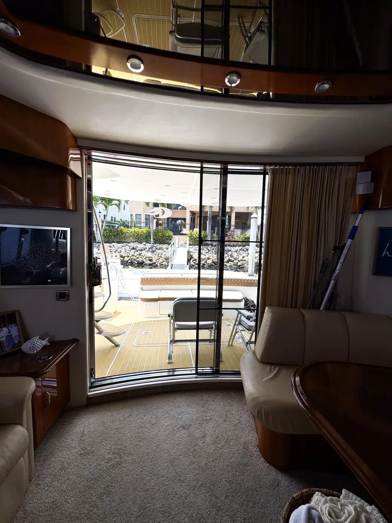 Slide: The Image of Interior view of 2006 Carver 560 Voyager yacht with sliding glass door. - 9