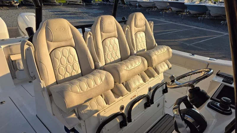 Slide: The Image of 2022 Sea Fox 328 Commander boat with luxurious beige seating. - 11