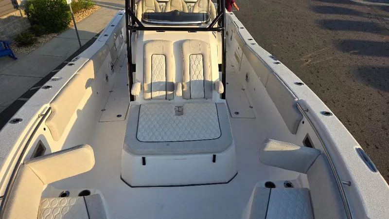 Slide: The Image of 2022 Sea Fox 328 Commander boat interior with seating and storage compartments. - 14