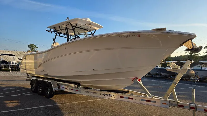 Slide: The Image of 2022 Sea Fox 328 Commander boat on trailer in parking lot. - 4