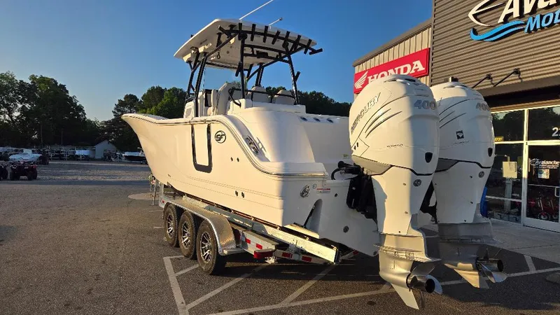 Slide: The Image of 2022 Sea Fox 328 Commander boat with twin outboard engines on a trailer. - 7