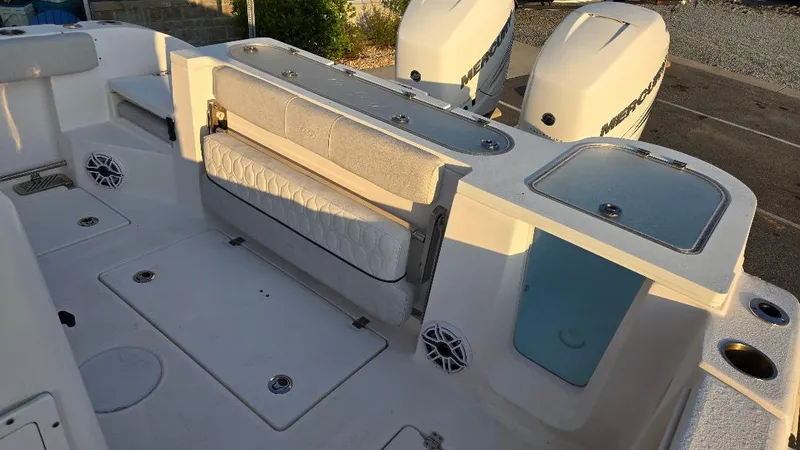 Slide: The Image of 2022 Sea Fox 328 Commander boat interior with twin outboard engines. - 8