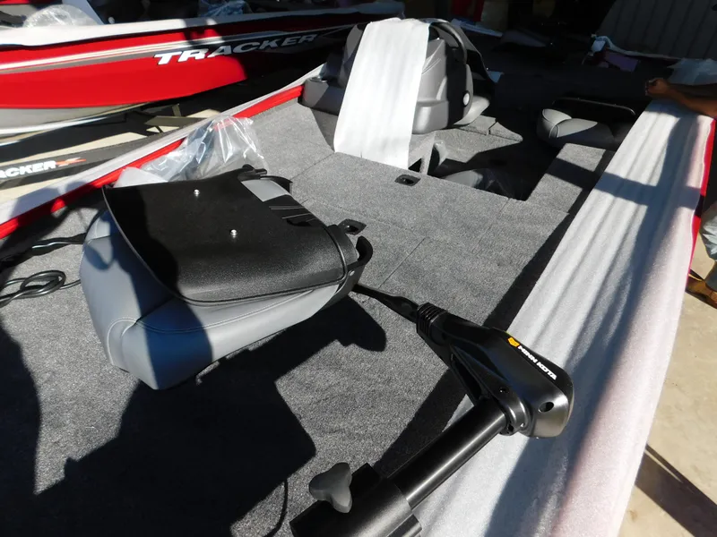 Slide: The Image of 2024 Tracker Pro 170 boat interior with seating and equipment. - 31