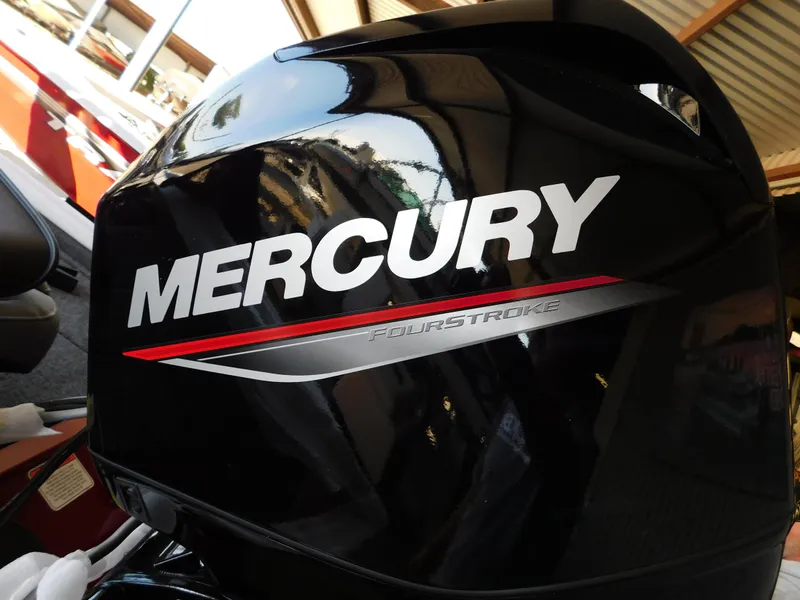 Slide: The Image of Mercury FourStroke engine on 2024 Tracker Pro 170 boat, close-up view. - 32