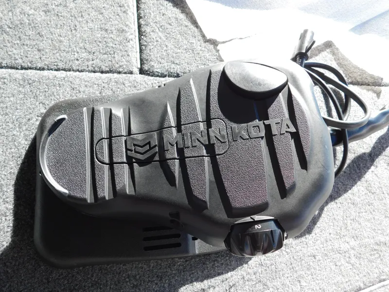 Slide: The Image of Minn Kota foot pedal on 2024 Tracker Pro 170 boat deck. - 34