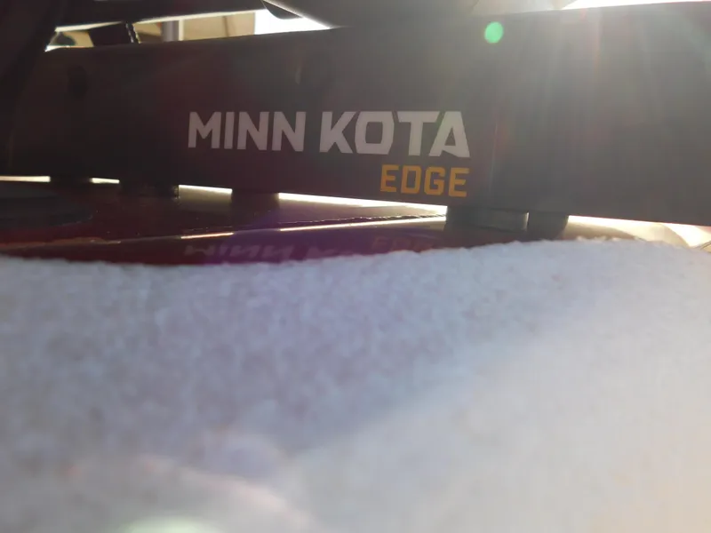 Slide: The Image of Minn Kota Edge motor on 2024 Tracker Pro 170 boat, close-up view. - 35