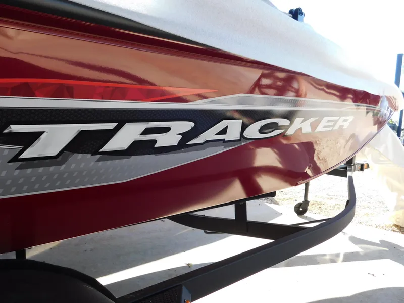 Slide: The Image of 2024 Tracker Pro 170 boat, red and white design, close-up view. - 39
