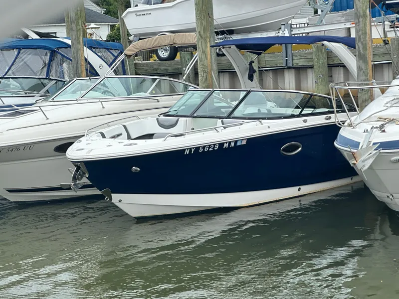 The Image of 2018 Chaparral 267 SSX boat docked at a marina. - 0