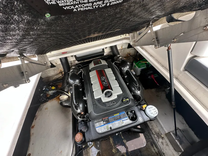 Slide: The Image of Engine compartment of a 2018 Chaparral 267 SSX boat. - 21