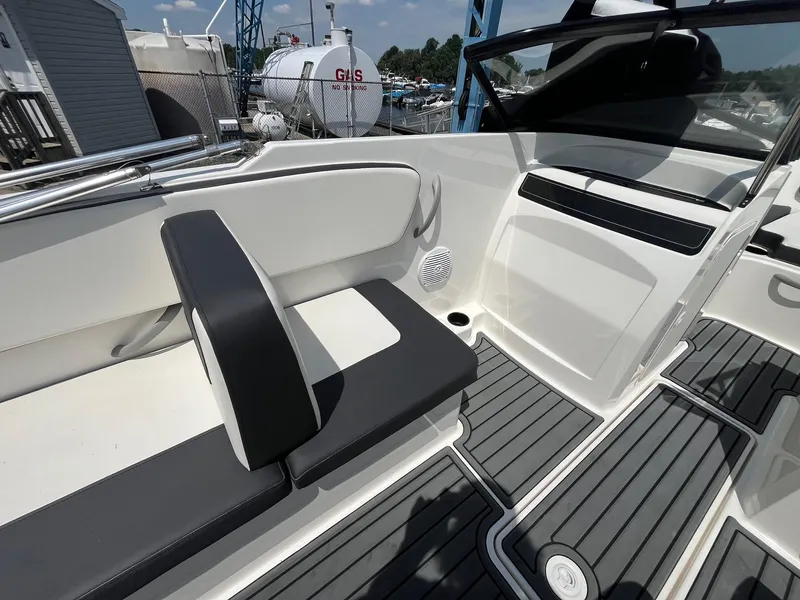 Slide: The Image of 2022 Bayliner VR4 Bowrider OB interior with seating and deck details. - 10