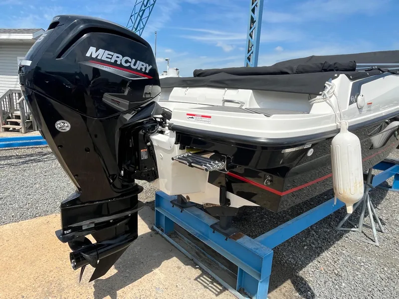 Slide: The Image of 2022 Bayliner VR4 Bowrider OB with Mercury outboard engine on display stand. - 12