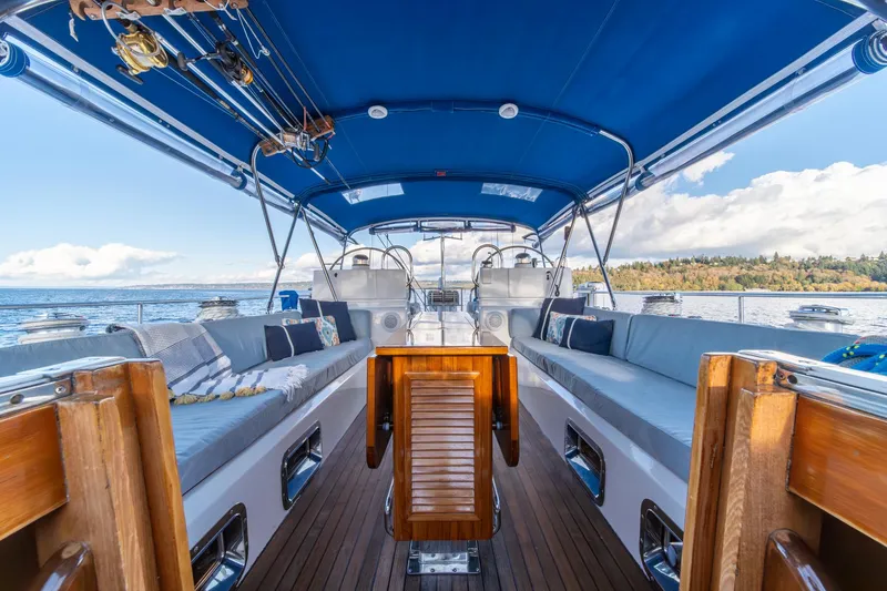 Slide: The Image of Luxurious 2010 Hylas 70 yacht interior with blue canopy and comfortable seating. - 15