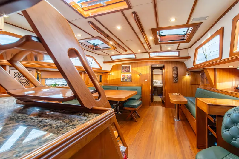 Slide: The Image of Luxurious interior of a 2010 Hylas 70 yacht with wood finishes and skylights. - 21