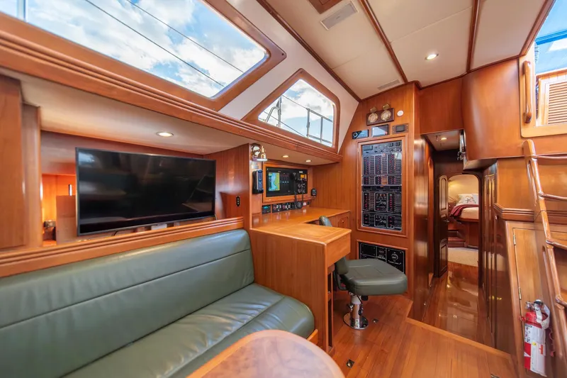 Slide: The Image of Luxurious interior of 2010 Hylas 70 yacht with wood paneling and modern amenities. - 27