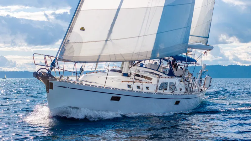 Slide: The Image of Sailing yacht Hylas 70, 2010 model, cruising on open water under clear skies. - 3