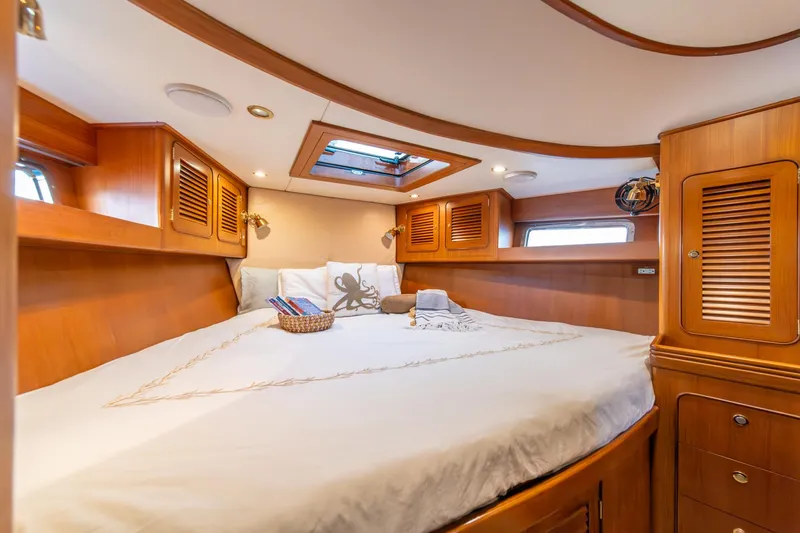 Slide: The Image of Luxurious cabin interior of 2010 Hylas 70 yacht with wood finish and skylight. - 40