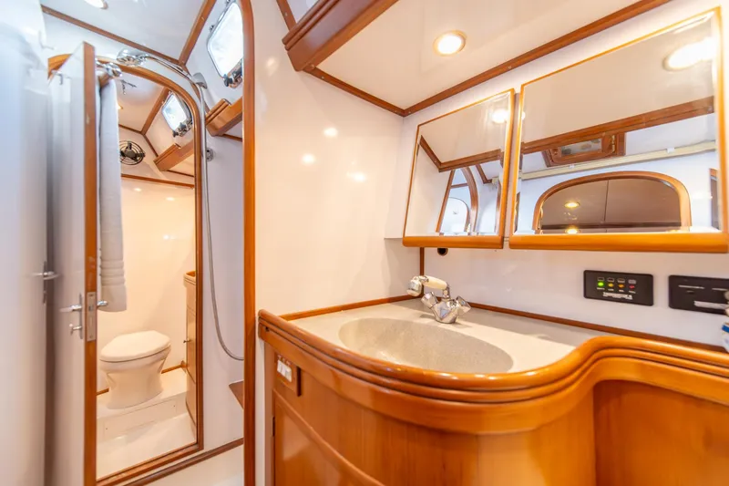Slide: The Image of Luxurious bathroom interior of 2010 Hylas 70 yacht with wooden accents and modern fixtures. - 46