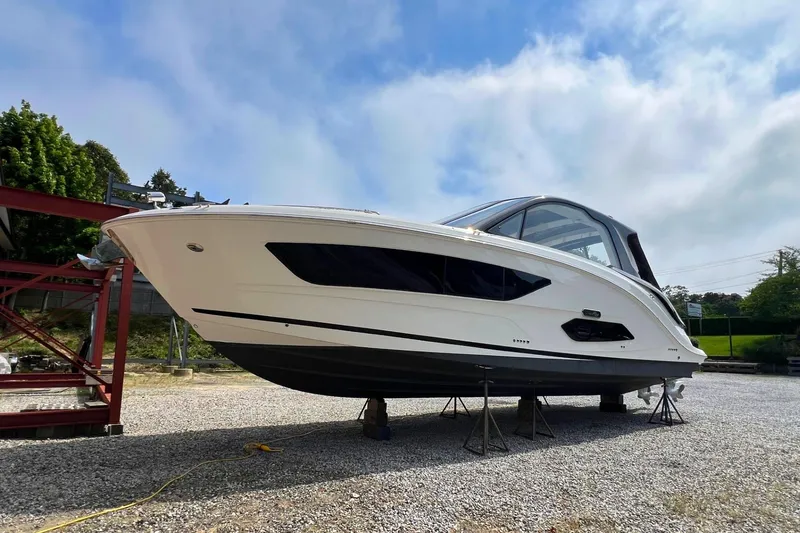 Slide: The Image of 2023 Sea Ray Sundancer 370 OB boat on dry dock. - 11