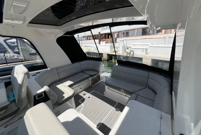 Slide: The Image of 2023 Sea Ray Sundancer 370 OB interior with spacious seating and modern design. - 20