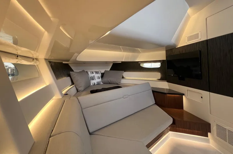 Slide: The Image of Luxurious interior of 2023 Sea Ray Sundancer 370 OB with modern lighting and comfortable seating. - 39