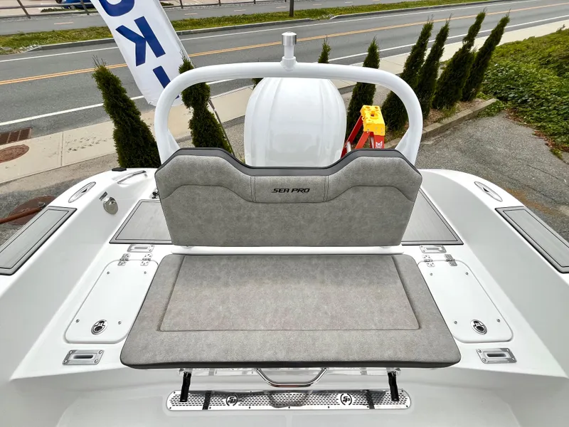 Slide: The Image of 2024 Sea Pro 245 FLX boat rear seating and deck view. - 19