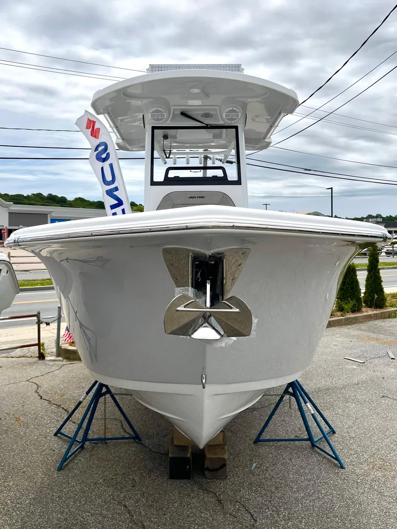 Slide: The Image of 2024 Sea Pro 245 FLX boat on display, front view. - 20
