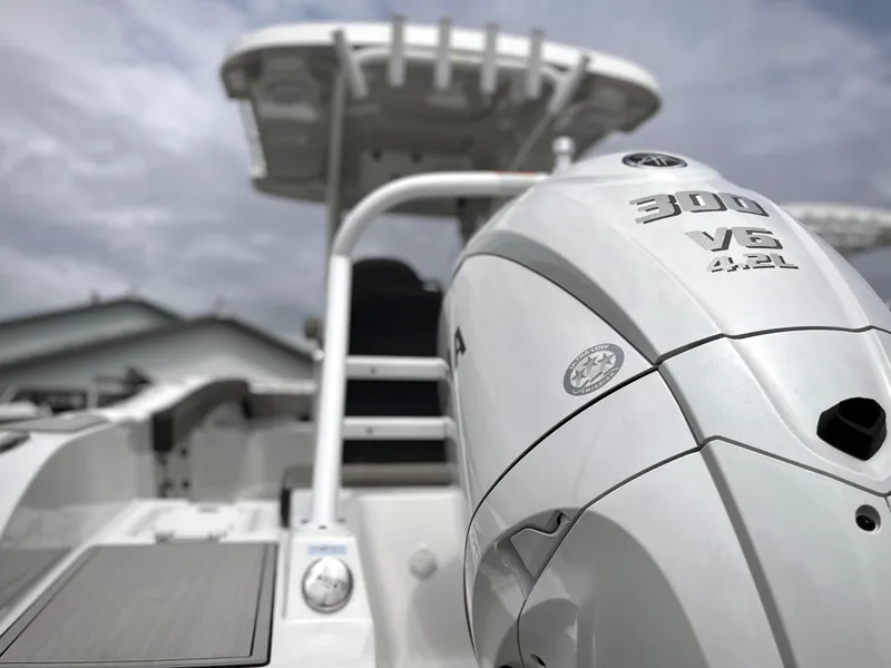 Slide: The Image of 2024 Sea Pro 245 FLX boat with powerful 300 V6 4.2L engine. - 4
