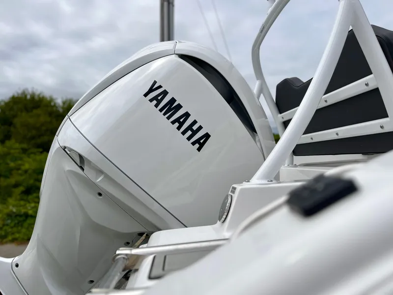 Slide: The Image of 2024 Sea Pro 245 FLX boat with Yamaha outboard motor. - 5