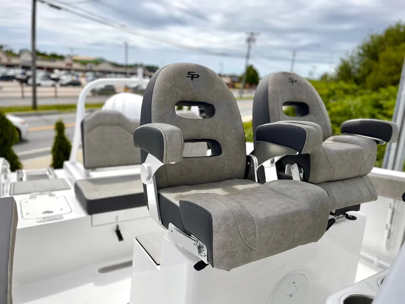 Slide: The Image of 2024 Sea Pro 245 FLX boat with comfortable seating and modern design. - 8